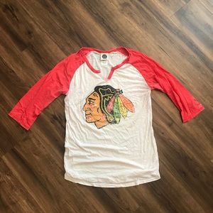 Black Hawks tee shirt.